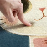 Adorable cartoon cat non slip memory foam bath mat with cotton velvet surface in a bright bathroom