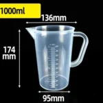 Transparent plastic lab beaker with measurement scale on kitchen counter