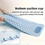 Oblong non-slip bath mat with suction cups on shower floor
