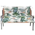 Outdoor bench cushion on a wooden garden bench with vibrant floral pattern