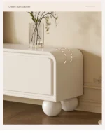 Nordic wood TV stand with drawers in a modern living room corner, featuring clean lines and ample storage