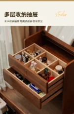 Wooden makeup vanity with mirror and stool in a modern bedroom setting