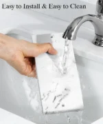 Electric toothbrush holder with three toothbrushes inserted, viewed from above.