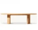 French Retro Oval Dining Table with teak base in a bright dining room