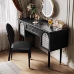 Goldoma compact vanity desk with drawer storage and mirror in a corner bedroom setting