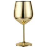 Set of 6 stainless steel wine glasses on a wooden table with red wine