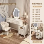Modern wood makeup vanity table with mirror, drawer, and stool in a bedroom setting