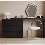 Modern vanity table with mirror and drawers in a bedroom setting