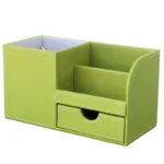 Leather PU storage box on a modern office desk with a laptop and notebook nearby.