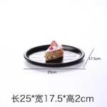 Black melamine dinner plates stacked elegantly on a wooden table