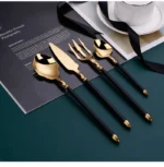 Elegant western dinnerware set with 4 pieces of 304 stainless steel spoon and fork on a table