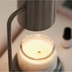 The lamp's dimmable knob and cord, showing control detail on a white desk surface.