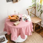 French country tablecloth with retro plaid pattern and lotus leaf edge on a dining table