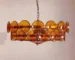 Nordic style colored glass chandelier in a modern living room