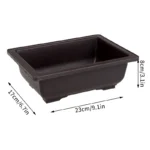 Plastic bonsai pot with tray, side view showing rectangular shape.