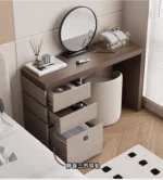 Minimalist wood dressing table with mirror and three storage drawers in modern bedroom setting
