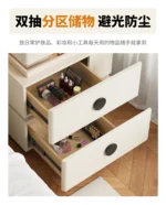 Modern lifting vanity table with mirror in cream finish, featuring rotating top and adjustable height for bedroom use