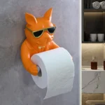 Goldoma bathroom paper roll rack mounted on tiled wall, holding a white tissue roll and smartphone.