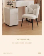 Modern vanity table with mirror and storage drawers in a bedroom setting