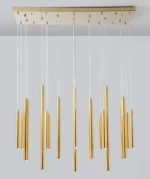 Rose gold mini pendant light with faceted glass in a dressing room.