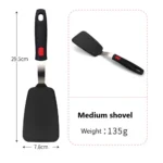 Goldoma high heat resistant spatula in use on a non-stick frying pan