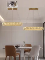 Luxury crystal chandelier illuminating a modern living room with sparkling light