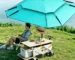 Large beach umbrella with octagonal canopy providing shade on a sunny beach