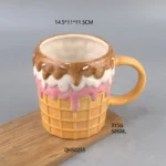 Cute donut ceramic coffee mug on a desk with cozy decor