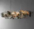 Modern chandelier for kitchen hanging over a kitchen island with metal fragment design