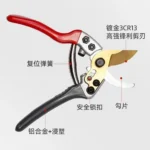 Goldoma pruning shears with a safety lock engaged, detailed view of the mechanism.