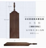 Elegant walnut cutting board with French vintage design, perfect for bread, cheese, and fruit presentation