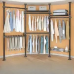 Freestanding coat rack with hooks holding jackets and bags in an entryway, adjustable design with sturdy steel frame