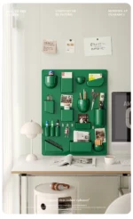 White desk organizer shelf with books and office supplies on a wooden desk