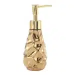 Goldoma ceramic toothbrush cup in golden hue, angled view highlighting the glossy glaze.