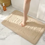 Non slip bath mat with suction cups on a bathroom floor