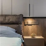 Modern pendant light with double cylindrical shades in a Nordic dining room setting