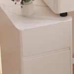 Modern vanity table with mirror and storage drawers in a bedroom setting