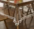 Elegant waterproof table cover with retro fringed lace on a dining table