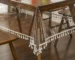 Elegant waterproof table cover with retro fringed lace on a dining table