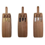 Acacia cheese board set with cheese knives and wooden cutting board on a table