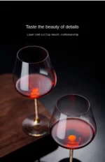 Elegant crystal wine glass set on a wooden table with soft lighting