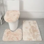 Plush bathroom rug set with toilet lid cover and mat in a cozy bathroom