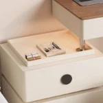 Modern lifting vanity table with mirror in cream finish, featuring rotating top and adjustable height for bedroom use