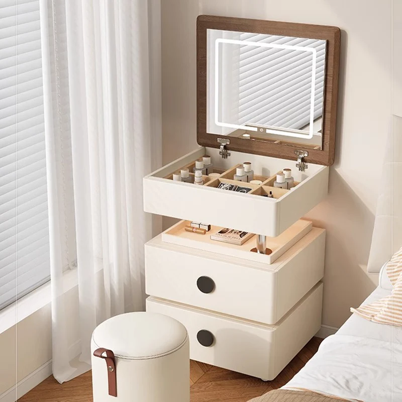 S3fdabad3aea34e5484c8a91efa54f4f9I.webp Modern lifting vanity table with mirror in cream finish, featuring rotating top and adjustable height for bedroom use