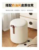 Modern lifting vanity table with mirror in cream finish, featuring rotating top and adjustable height for bedroom use