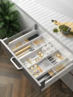 Kitchen drawer organizer with compartments for cutlery and utensils