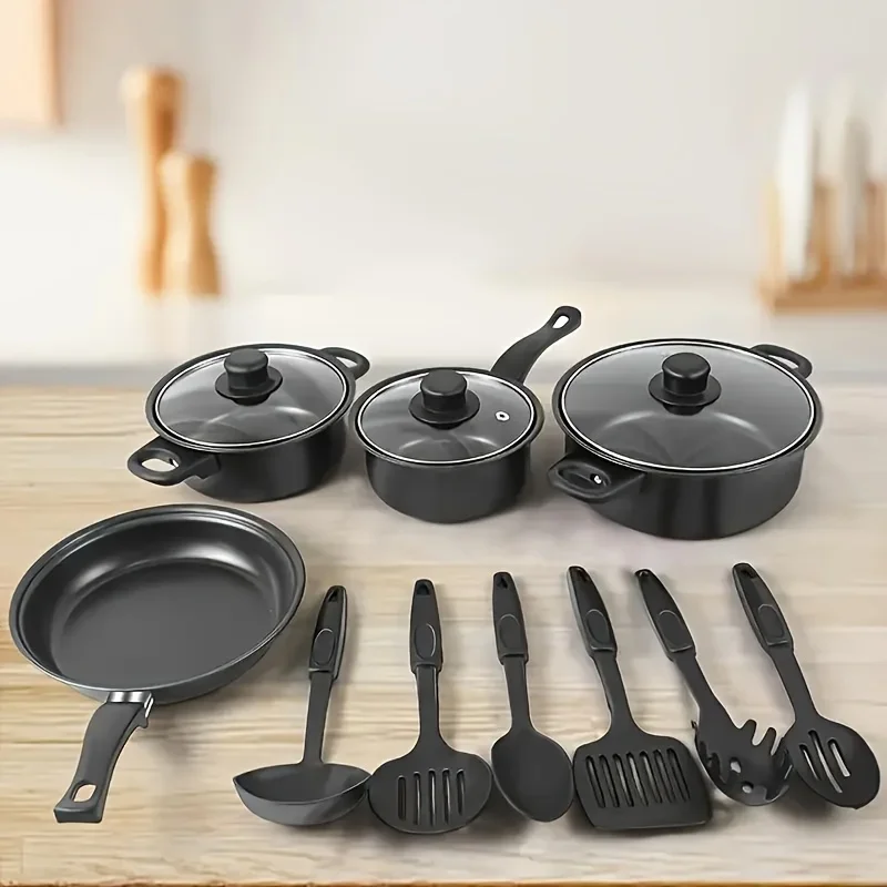 Goldoma 13-piece nonstick cookware set black with pots, pans and utensils on induction stove