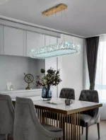 Luxury crystal chandelier illuminating a modern living room with sparkling light