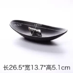 Black melamine dinner plates stacked elegantly on a wooden table
