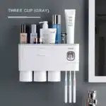 Top-down view of the set arranged neatly on a bathroom shelf with other accessories.